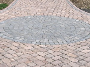 Vintage Circle Stone Combining paving materials can add interest and beauty to your driveway or walkway.